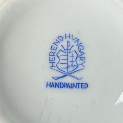 Sale Photo Thumbnail #607: Includes a Royal Worcester cake plate and server, Buckingham Palace English china, Herend Hungary hand painted coffee pot, and a Villeroy & Boch porcelain tea pot. Total of six pieces. Measurement of largest: 11” Diameter. [CS]