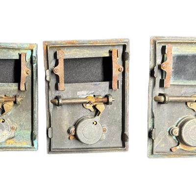 Sale Photo Thumbnail #622: All pieces feature the Flying Eagle motif, and have single dial combination locks. Total of three pieces. Measurement: 5” x 4” (each). [CS]