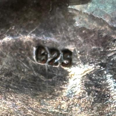 Sale Photo Thumbnail #638: **WIRE TRANSFER IS REQUIRED IF SHIPPED.** [26.57g] Includes a turquoise cabochon stick pin, a marcasite turtle, a horse head pin, and a bell pin. The horse head pin is marked “Beau Navajo.” Total of four pieces. Measurement of largest: 2.25”. Silver