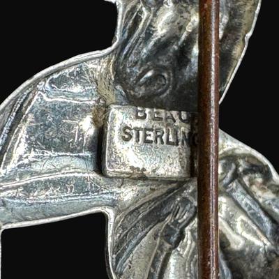 Sale Photo Thumbnail #636: **WIRE TRANSFER IS REQUIRED IF SHIPPED.** [26.57g] Includes a turquoise cabochon stick pin, a marcasite turtle, a horse head pin, and a bell pin. The horse head pin is marked “Beau Navajo.” Total of four pieces. Measurement of largest: 2.25”. Silver