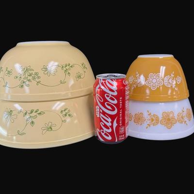 Sale Photo Thumbnail #644: Includes a set of two butterfly gold nesting bowls, and two Shenandoah mixing bowls. Total of four bowls. Measurement of largest: 10.5” Diameter. [CS]