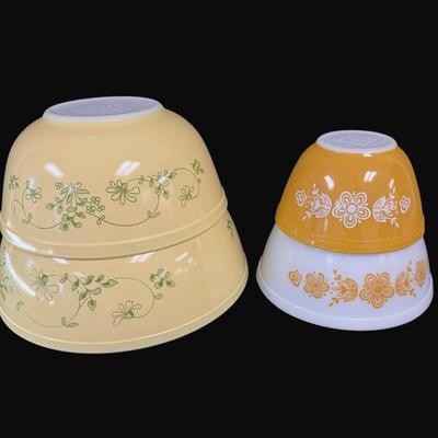 Sale Photo Thumbnail #643: Includes a set of two butterfly gold nesting bowls, and two Shenandoah mixing bowls. Total of four bowls. Measurement of largest: 10.5” Diameter. [CS]