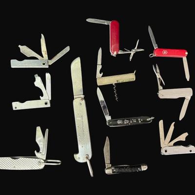 Sale Photo Thumbnail #648: Includes U.S. Gov’t., Victronox, Trim, and more. Total of 11 pieces. Measurement of longest: 7” (open). [CS]