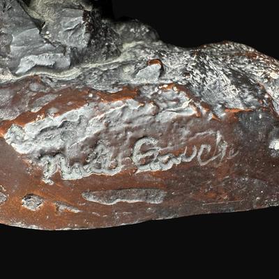 Sale Photo Thumbnail #658: Signed. On a marble base. The statue needs to be reattached to the base. Measurement: 12”L (bronze); 14.25” x 9.25” (base). [DR]