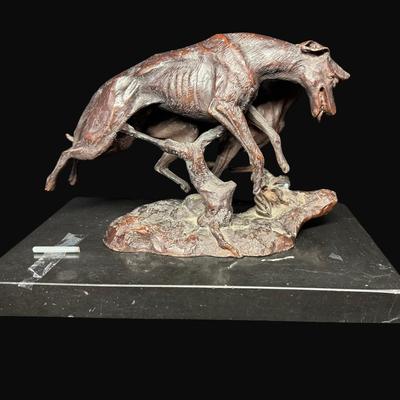 Sale Photo Thumbnail #653: Signed. On a marble base. The statue needs to be reattached to the base. Measurement: 12”L (bronze); 14.25” x 9.25” (base). [DR]