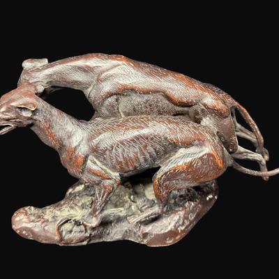 Sale Photo Thumbnail #657: Signed. On a marble base. The statue needs to be reattached to the base. Measurement: 12”L (bronze); 14.25” x 9.25” (base). [DR]