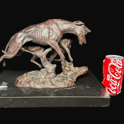 Sale Photo Thumbnail #654: Signed. On a marble base. The statue needs to be reattached to the base. Measurement: 12”L (bronze); 14.25” x 9.25” (base). [DR]