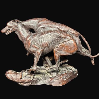 Sale Photo Thumbnail #656: Signed. On a marble base. The statue needs to be reattached to the base. Measurement: 12”L (bronze); 14.25” x 9.25” (base). [DR]