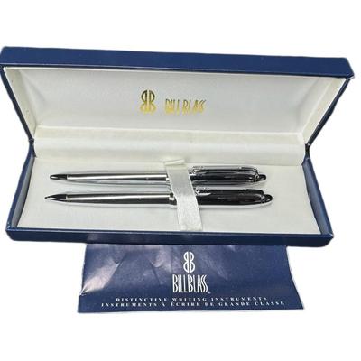 Sale Photo Thumbnail #672: Includes a Pierre Cardin pen and pencil set, a chromed Bill Blass pen and pencil set, and a Waterford crystal desk pen. Total of three pieces. [CS]