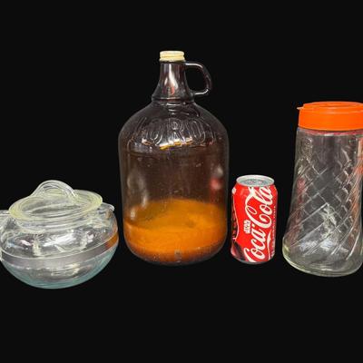 Sale Photo Thumbnail #676: Includes a Pyrex Flameware tea kettle, a vintage Clorox bottle, and a vintage Tang pitcher. Total of three pieces. [CS]