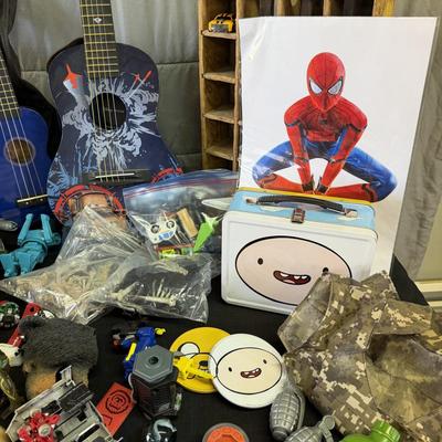 Sale Photo Thumbnail #205: Toys and toys, Guitar, Ukelele, Transformers, and more.