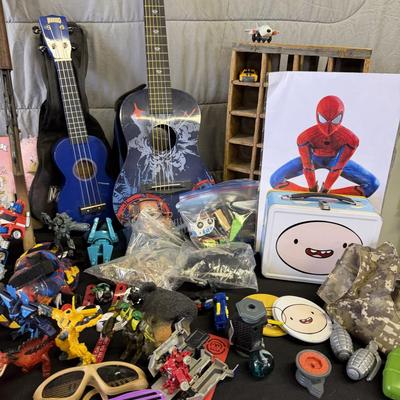 Sale Photo Thumbnail #202: Toys and toys, Guitar, Ukelele, Transformers, and more.