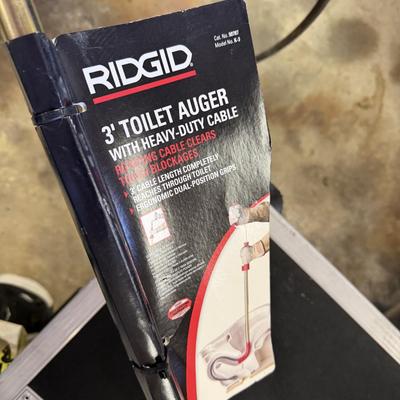 Sale Photo Thumbnail #215: Power Tools, Large rolling Box, New Auger, And Gas cans.