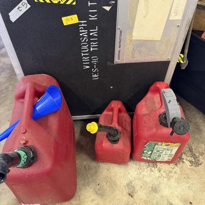 Sale Photo Thumbnail #213: Power Tools, Large rolling Box, New Auger, And Gas cans.
