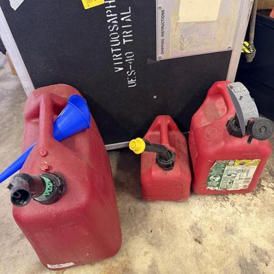 Sale Photo Thumbnail #214: Power Tools, Large rolling Box, New Auger, And Gas cans.