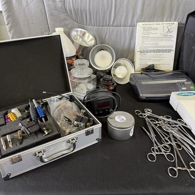 Sale Photo Thumbnail #235: Lot of Tattoo Supplies Lights, Tracers, books and more.