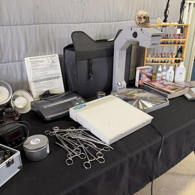 Sale Photo Thumbnail #233: Lot of Tattoo Supplies Lights, Tracers, books and more.