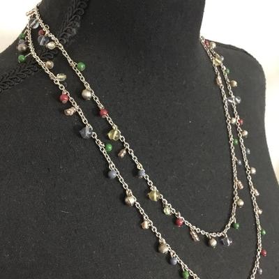 Beautiful Silvertone necklace and matching earrings