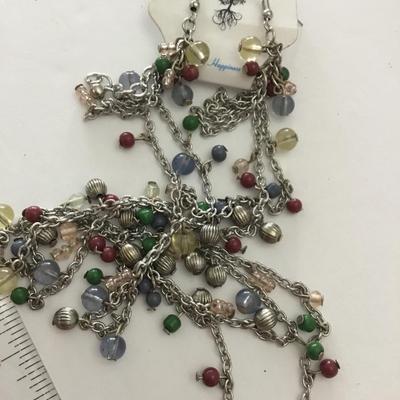 Beautiful Silvertone necklace and matching earrings