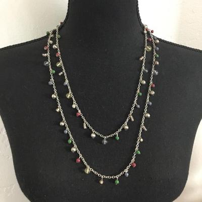 Beautiful Silvertone necklace and matching earrings