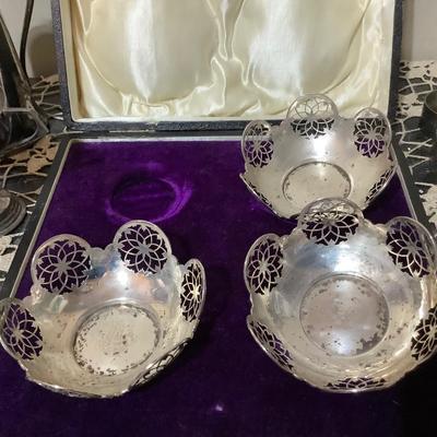 Sale Photo Thumbnail #249: You get 13 silver napkins rings, three nut cups in a great case. You also get silver round tray, silver cup, silver lid, and other items.