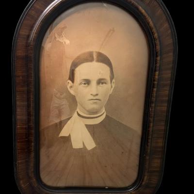 Sale Photo Thumbnail #710: This is a wood frame with tiger wood veneer. Both the frame and glass are intact. Age related wear. Measurement: 24” x 16”. [CS]