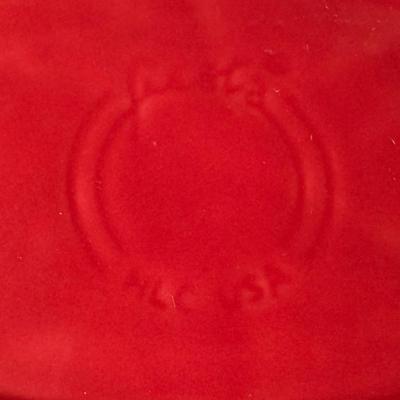 Sale Photo Thumbnail #716: Includes a Nancy Gardner hand built cream and sugar, a vintage Frankoma leaf bowl, and an individual modern Fiesta casserole. Total of four pieces. Measurement of largest: 9”. [CS]