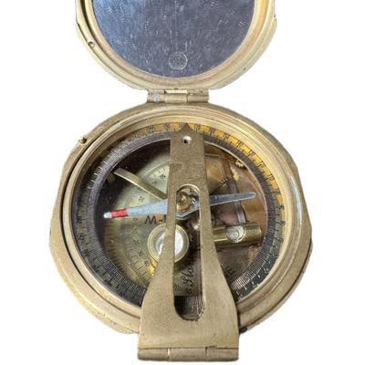 Sale Photo Thumbnail #723: Includes a Stanley London nautical brass compass, a K&E Doric lettering set, and a pair of Jason 2x opera theater glasses. Total of three pieces. Not tested. Measurement of largest: 12.5”. [CS]