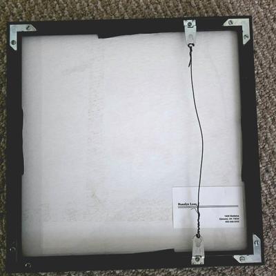 Sale Photo Thumbnail #232: This is a unique abstract raku clay art by Oklahoma mixed media and ceramics artist, Harolyn Long. Signed and framed. Frame measures 12" x 12".