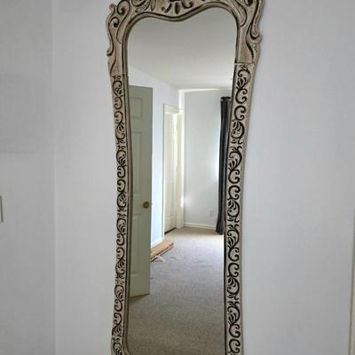 Sale Photo Thumbnail #233: Beautiful ornate wall mirror with a unique design and plenty of style. It was originally purchased from Garbes in Tulsa, It measures 69"L x 25"W.