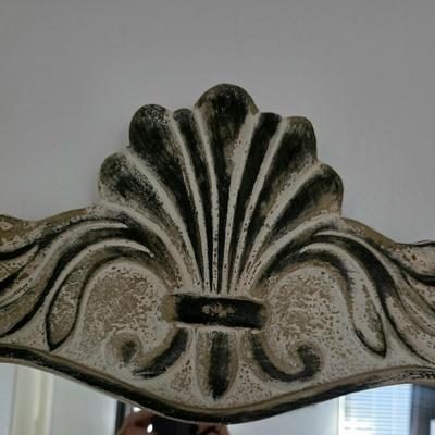Sale Photo Thumbnail #235: Beautiful ornate wall mirror with a unique design and plenty of style. It was originally purchased from Garbes in Tulsa, It measures 69"L x 25"W.