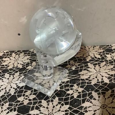 Sale Photo Thumbnail #284: This is a great crystal world paper weight with acrylic hand holder.