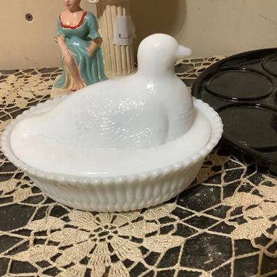 Sale Photo Thumbnail #313: You get a great black glass tray, milk glass dove on a nest, and lady mini desk lamp.