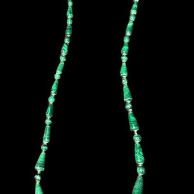 Sale Photo Thumbnail #742: Includes a Les Bernard multi-strand lapis necklace, an onyx necklace, a nephride necklace, a malachite necklace, and men’s Seiko watches. Total of nine pieces. Watches not tested. Measurement of longest piece: 14”. [CS]