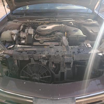 1994 Cadillac 6-person Passenger car - ninth-generation Cadillac DeVille sedan.211817 miles