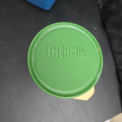 Small Rubbermaid cooler with a Gott water cooler and a thermos