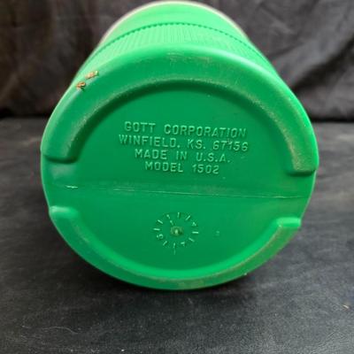 Small Rubbermaid cooler with a Gott water cooler and a thermos