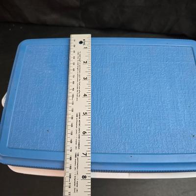 Small Rubbermaid cooler with a Gott water cooler and a thermos