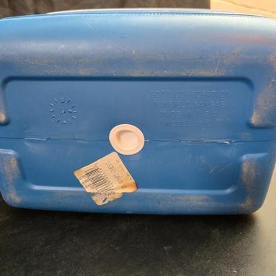 Small Rubbermaid cooler with a Gott water cooler and a thermos