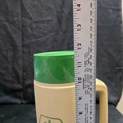 Small Rubbermaid cooler with a Gott water cooler and a thermos