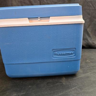 Small Rubbermaid cooler with a Gott water cooler and a thermos
