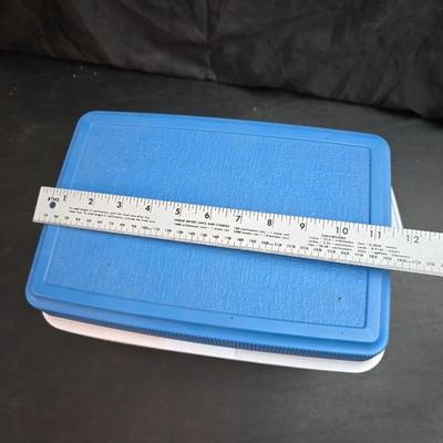 Small Rubbermaid cooler with a Gott water cooler and a thermos