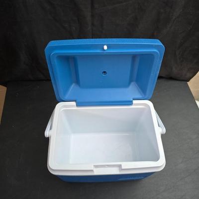 Small Rubbermaid cooler with a Gott water cooler and a thermos