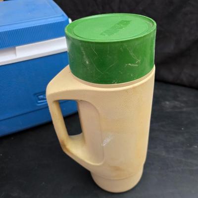 Small Rubbermaid cooler with a Gott water cooler and a thermos