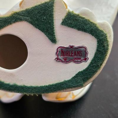 Completed and framed Paragon Needlecraft Exquisite Hummel artwork - three brass candle sticks and two Norleans Angel figures