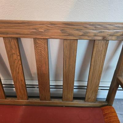 Vintage A. Brandt Ranch Oak sofa with original orange textured fabric cushions.