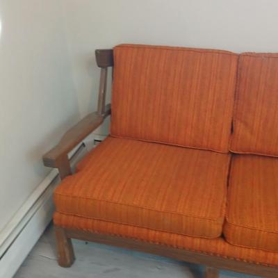 Vintage A. Brandt Ranch Oak sofa with original orange textured fabric cushions.