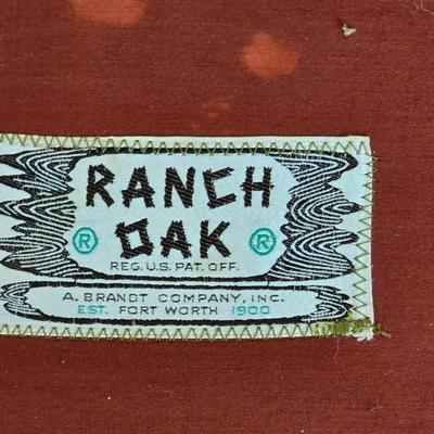 Vintage A. Brandt Ranch Oak sofa with original orange textured fabric cushions.