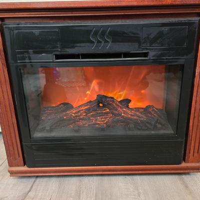 Working Heat Surge electric fireplace Model M7