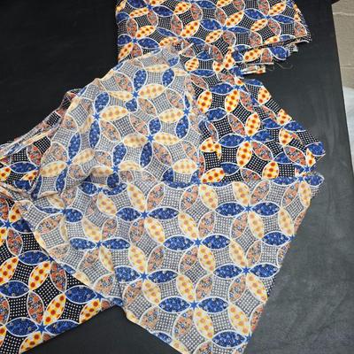 Singer button holder with large fabric scraps and vintage needles